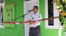 Sambutan Gatot Sukoco yang bekerja di Bidang Pengawasan Koperasi dan Tenaga Ahli Muda Dinas Provinsi mewakili Kepala Dinas Koperasi dan UMKM Provinsi Banten Dalam Penyerahan Rumah Gratis Kopsyah BMI Ke-477